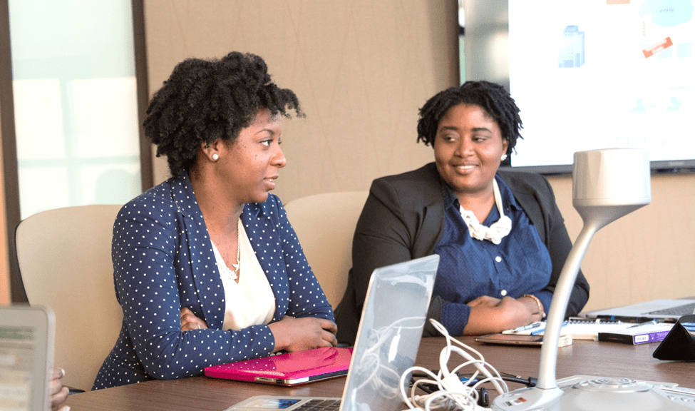Two black businesswomen in a meeting