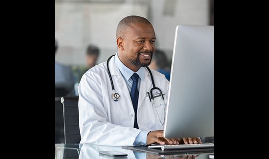 doctor at computer